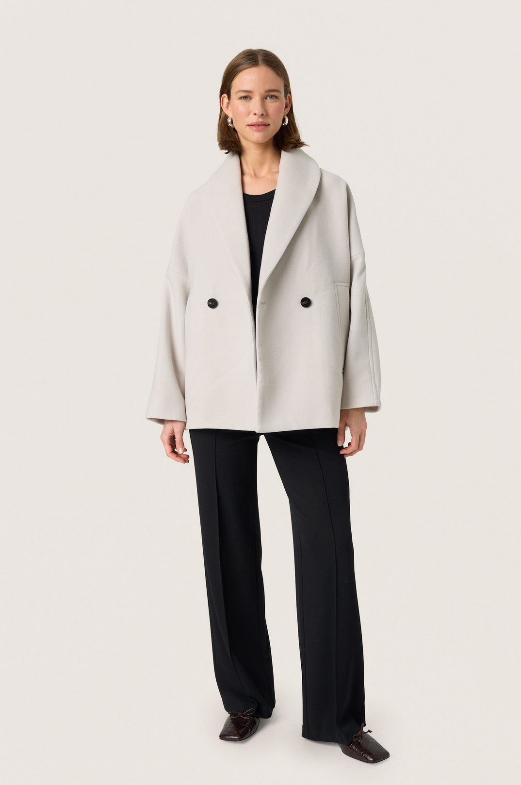 Rubie Peacoat Ancient scroll