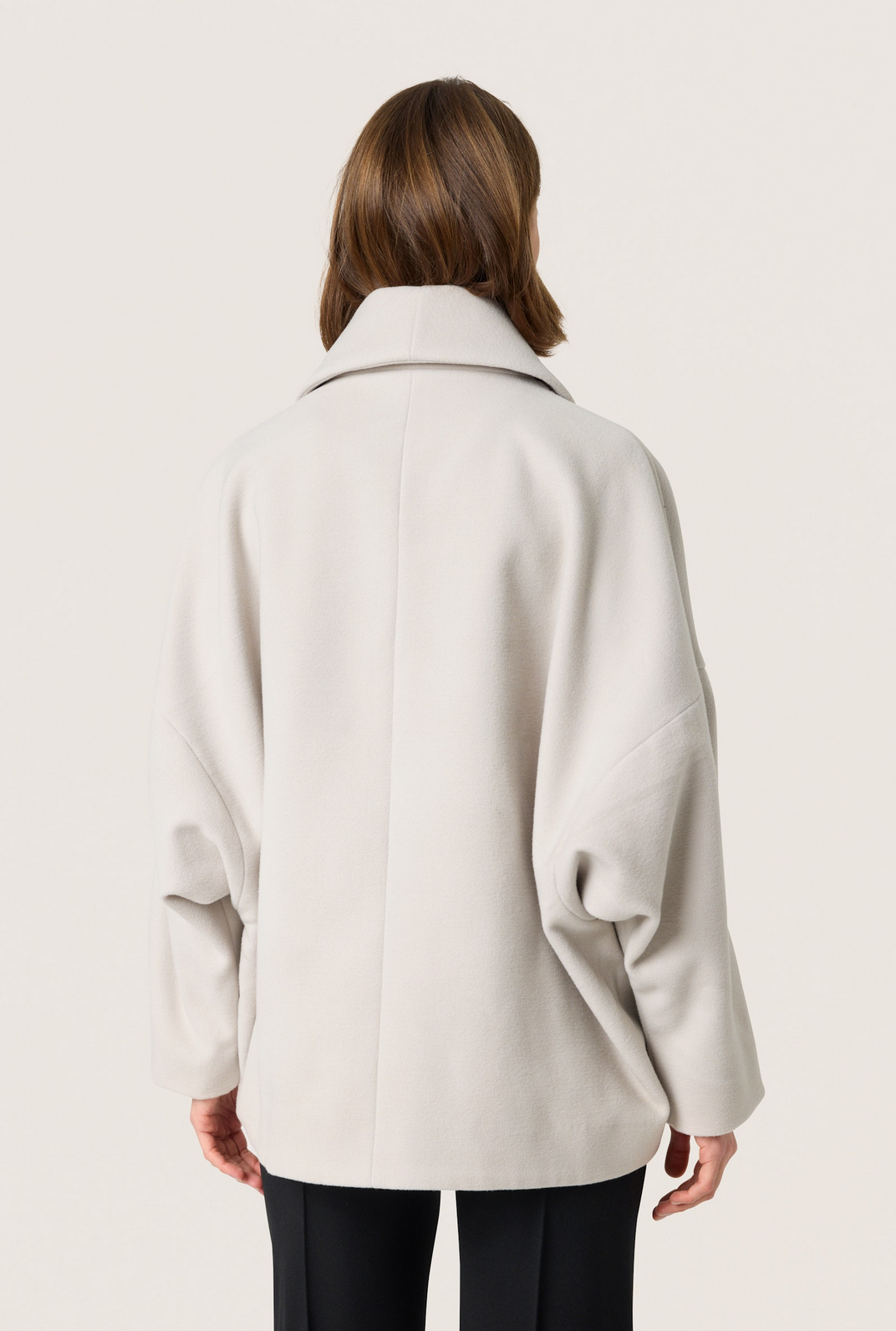 Rubie Peacoat Ancient scroll