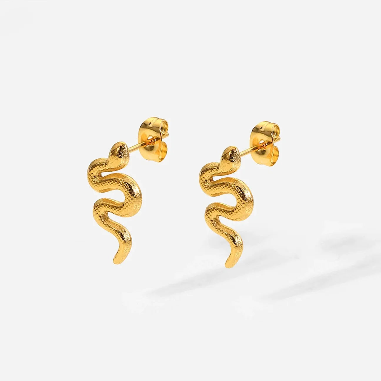 Unexptected thrills earrings Gold